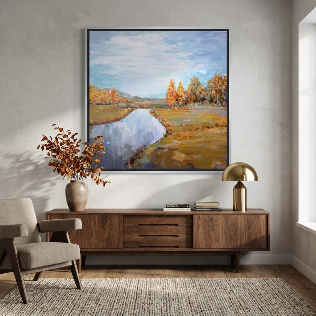 Canvas wall art with a silver leaf surround styled in a neutral living room
