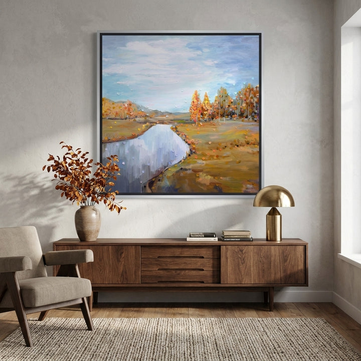Canvas wall art with a silver leaf surround styled in a neutral living room