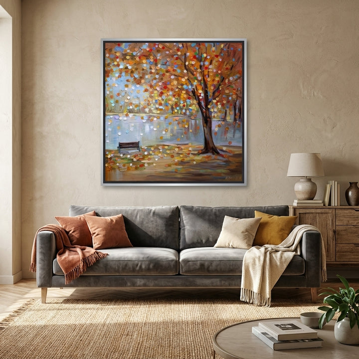Canvas wall art with a silver leaf surround styled in a neutral living room
