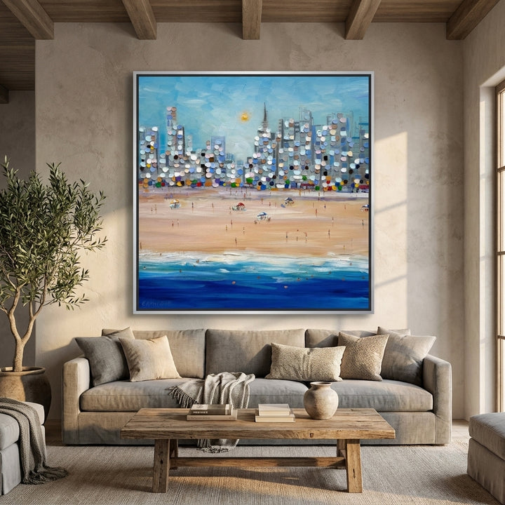 Oversized statement canvas wall art with a silver leaf surround styled in a neutral living room