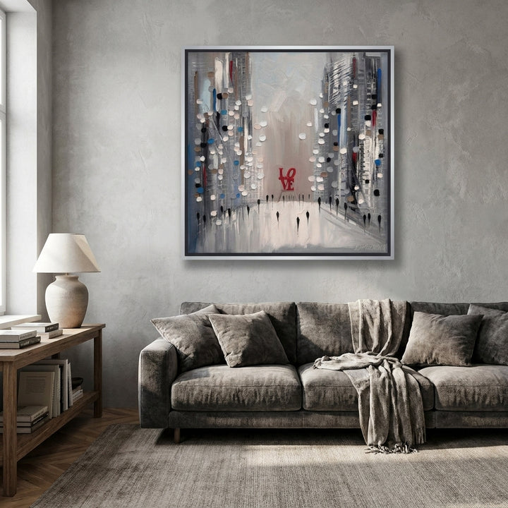 Canvas wall art with a silver leaf surround styled in a neutral living room