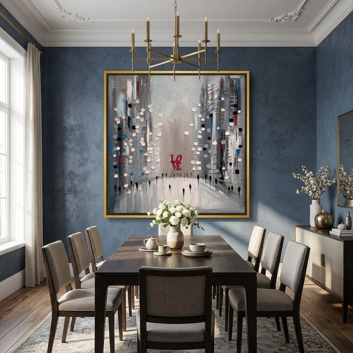 Oversized statement canvas wall art with a gold leaf surround styled in a contemporary dining room