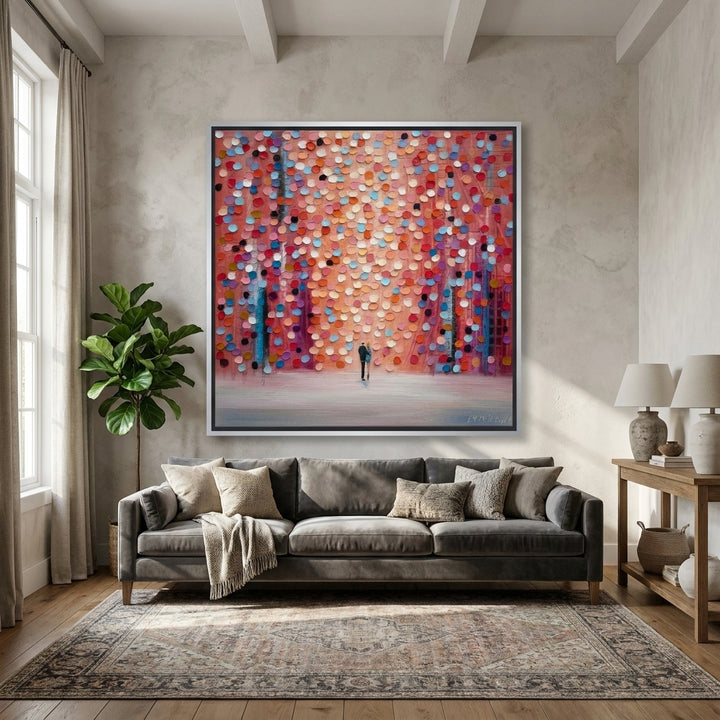 Oversized statement canvas wall art with a silver leaf surround styled in a neutral living room