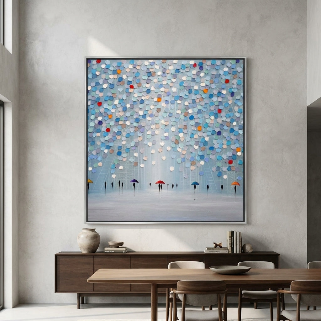 Oversized statement canvas wall art with a silver leaf surround styled in a contemporary dining room