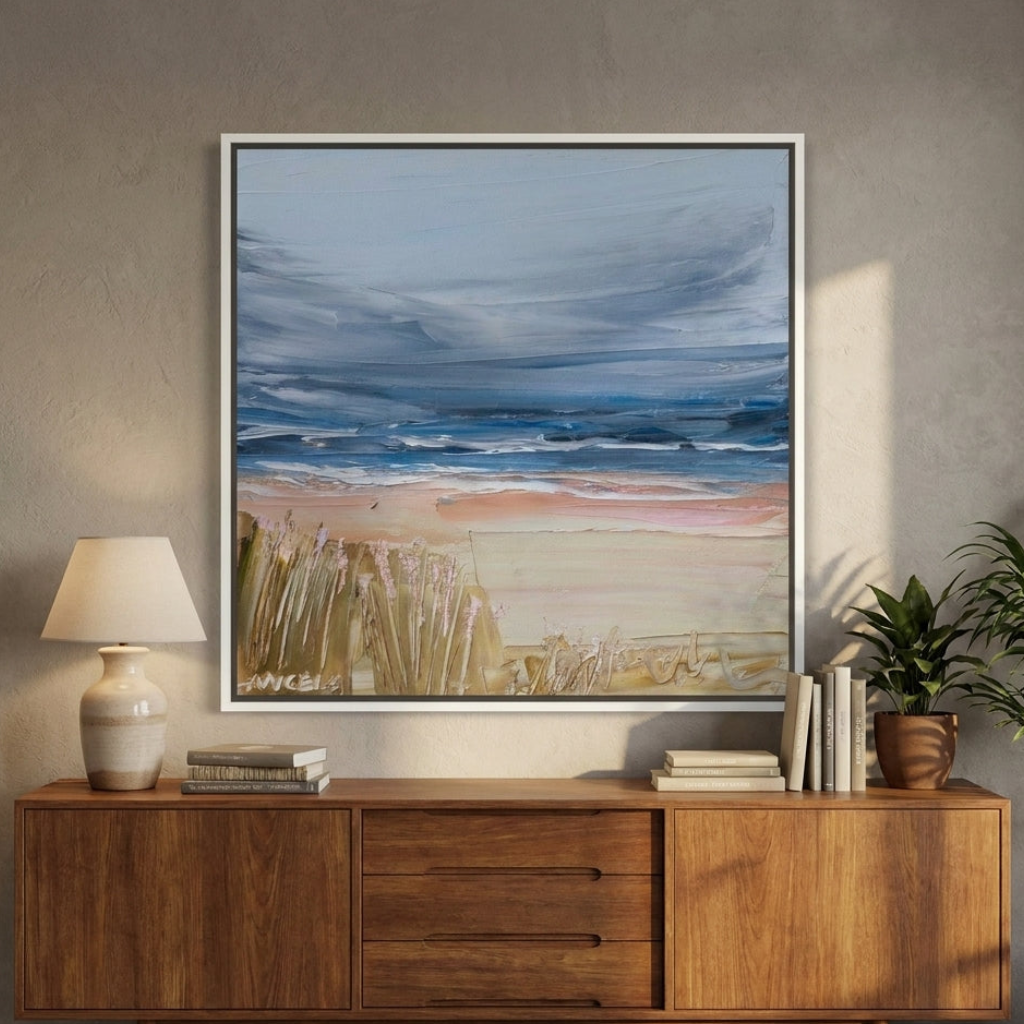Canvas wall art with a white surround styled in a bright modern office