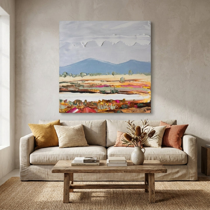 Stretched canvas wall art styled in a neutral living room