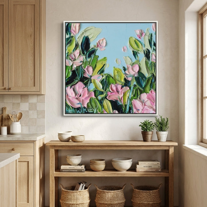 Canvas wall art with a white surround styled in a bright modern kitchen