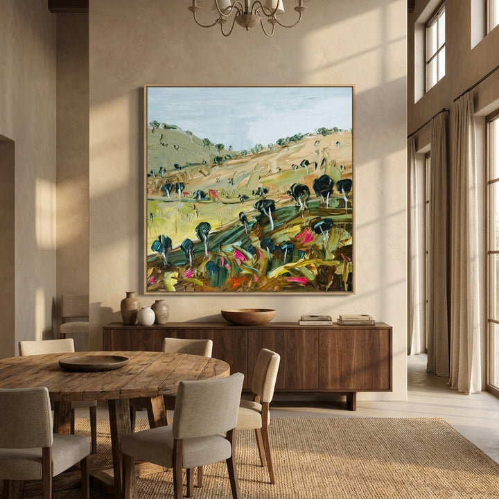 Oversized statement canvas wall art with a natural timber surround styled in a contemporary dining room