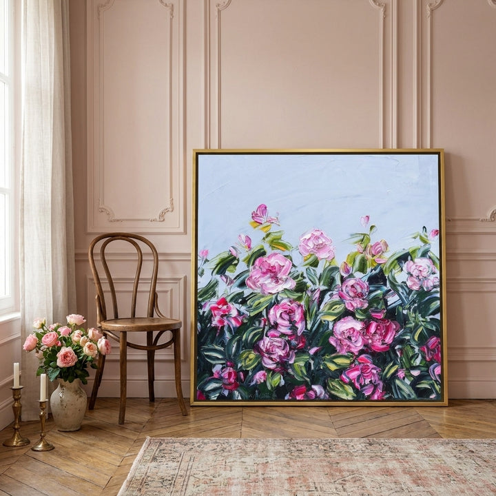 Canvas wall art with a gold leaf surround leaning against the wall in a Parisian kitchen