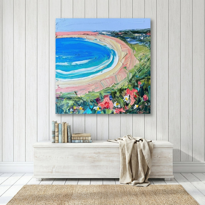 Stretched canvas wall art styled on the wall in a coastal living room