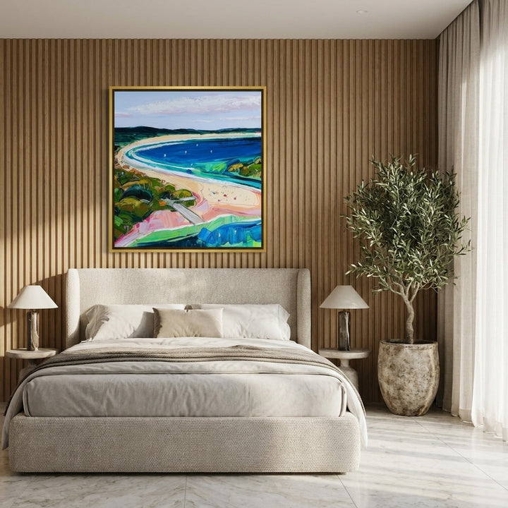 Canvas wall art with a gold leaf surround styled on the wall in a luxe bedroom