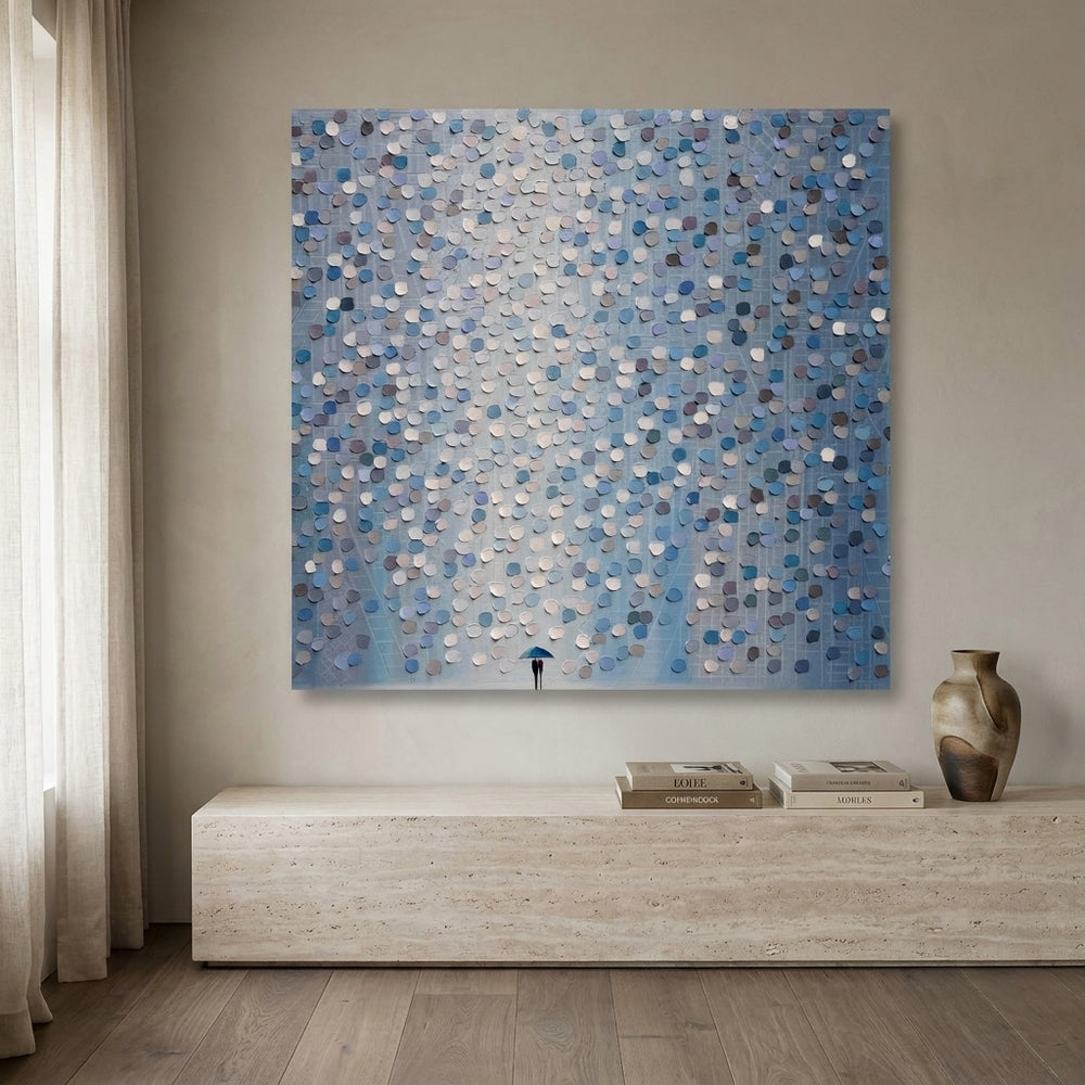 Stretched canvas wall art styled on the wall in a luxe living room