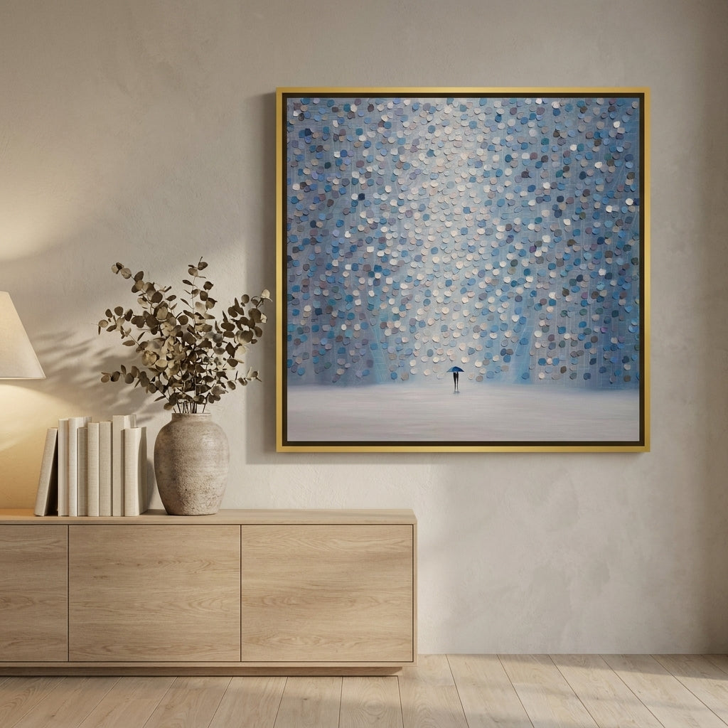 Canvas wall art with a gold leaf surround styled on the wall in a warm Japandi living room