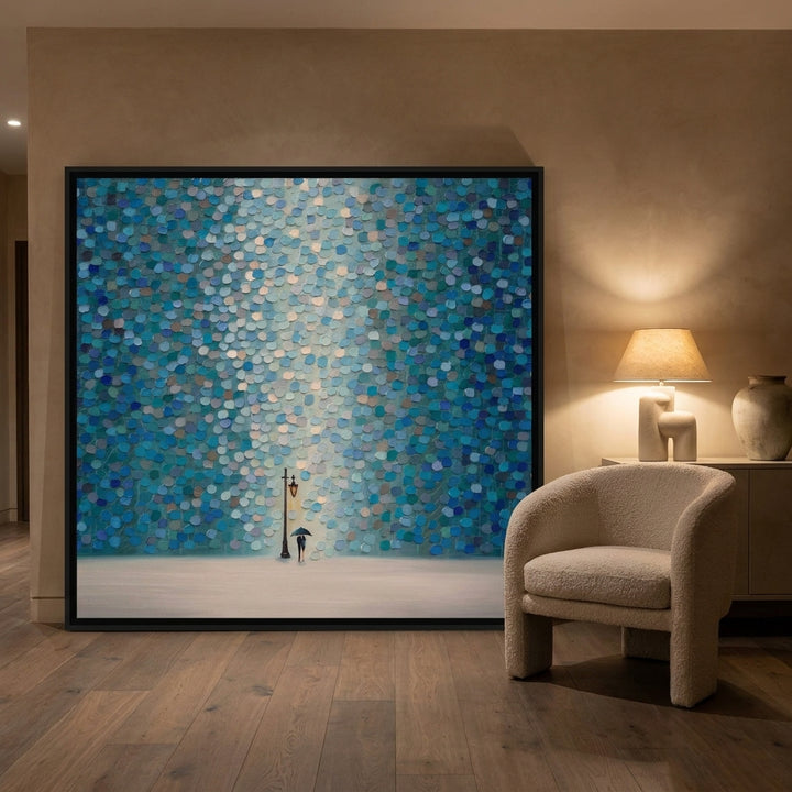 Oversized statement canvas wall art with a black surround leaning against the wall in a luxe dining room