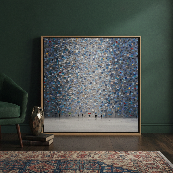 Canvas wall art with a natural timber surround leaning against the wall in a moody home office