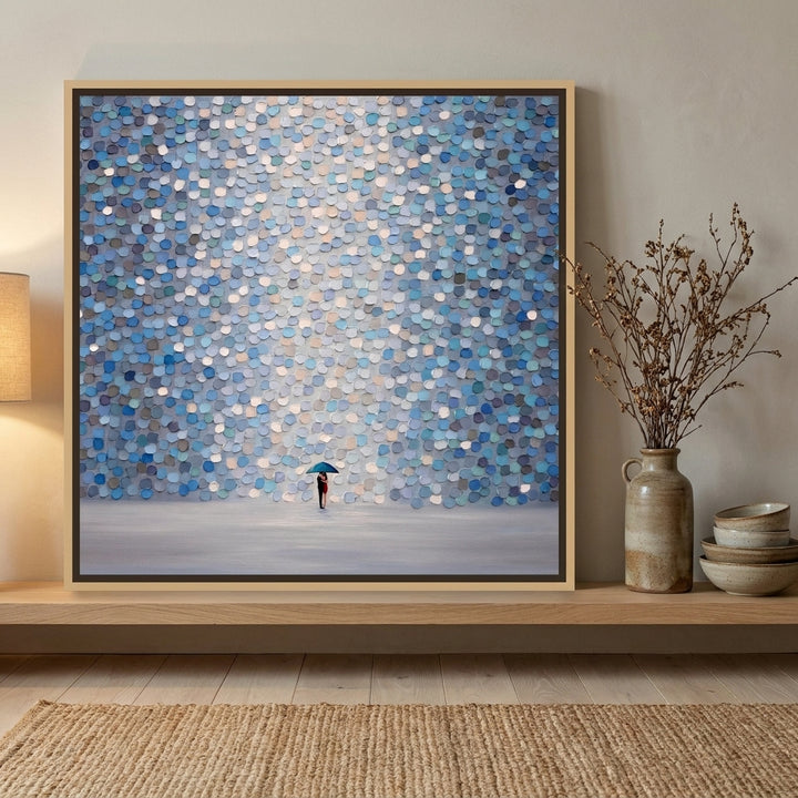Canvas wall art with a natural timber surround standing on a shelf in a warm Japandi bedroom