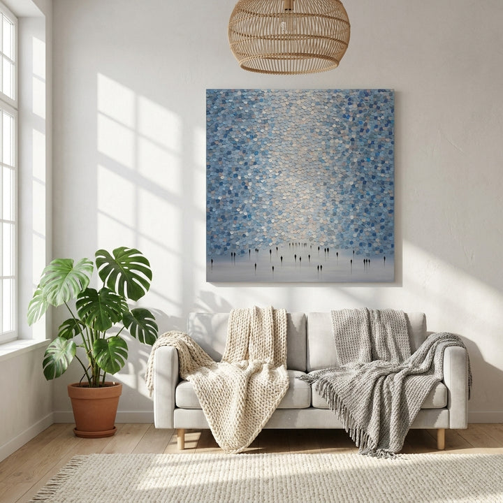 Stretched canvas wall art styled on the wall in a bright Scandinavian living room