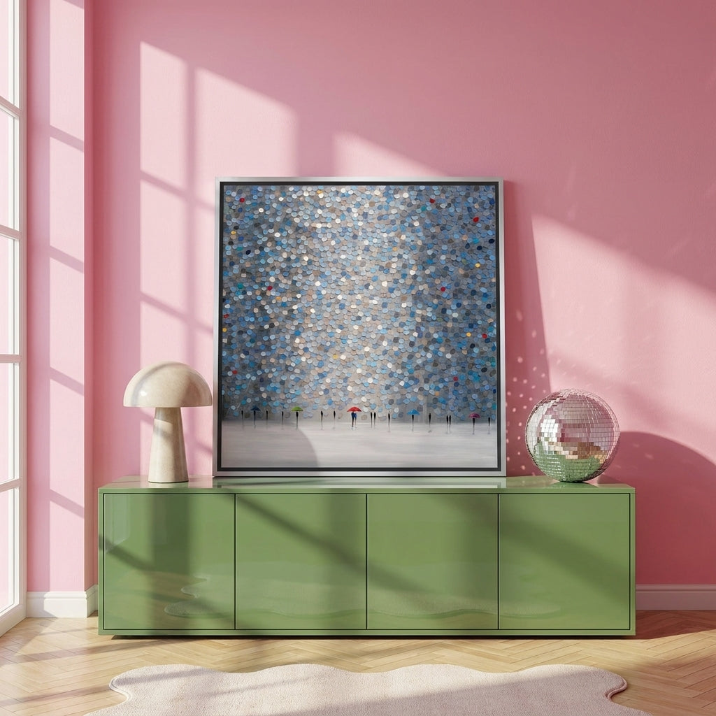 Canvas wall art with a silver leaf surround standing on a sideboard in a colourful eclectic living room