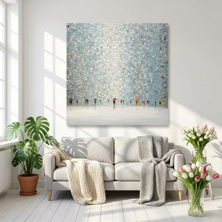 Stretched canvas wall art styled on the wall in a bright Scandinavian living room