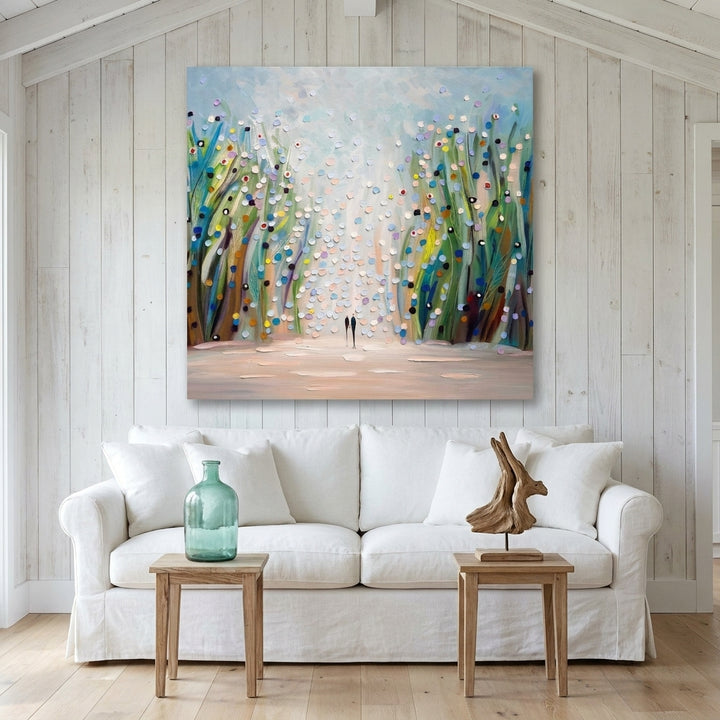 Stretched canvas wall art styled on the wall in a coastal living room
