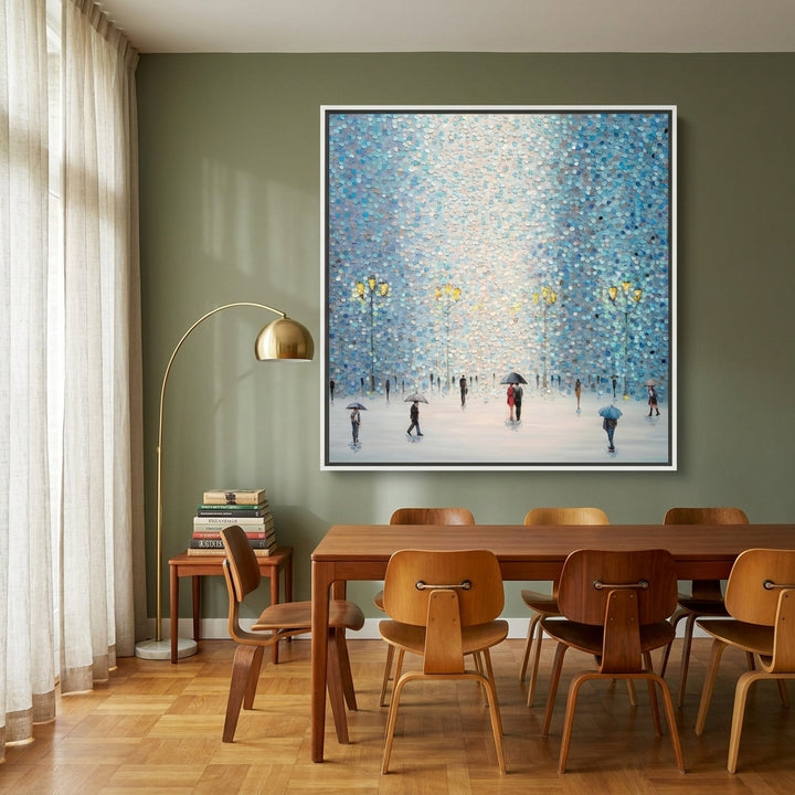 Oversized statement canvas wall art with a white surround styled on the wall in a mid-century dining room