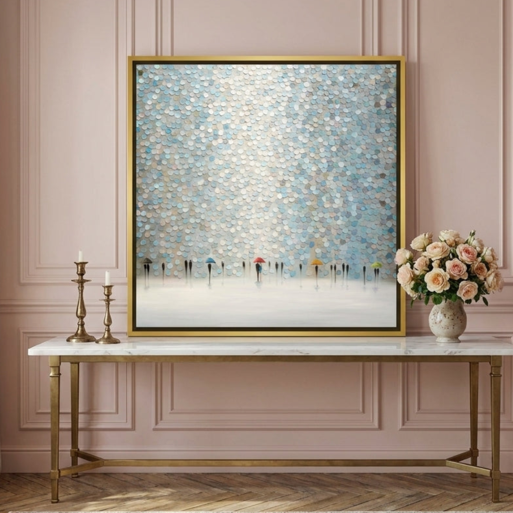 Canvas wall art with a gold leaf surround standing on a console in a Parisian living room