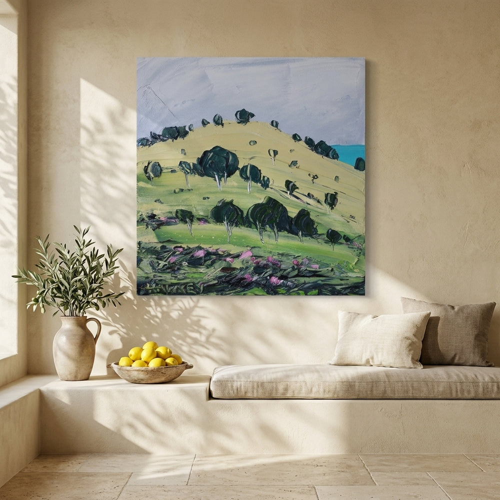 Stretched canvas wall art styled on the wall in a Mediterranean living room