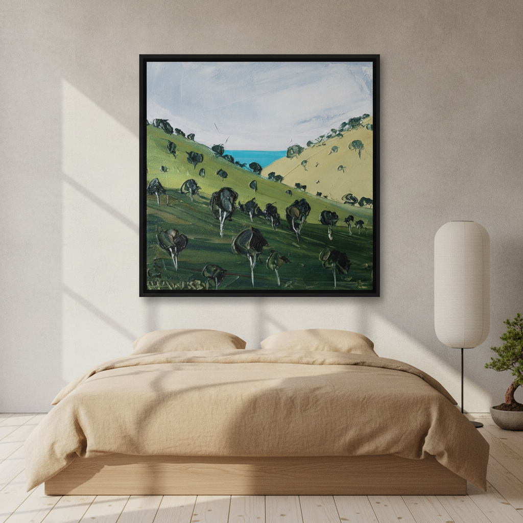 Canvas wall art with a black surround styled on the wall in a warm Japandi bedroom
