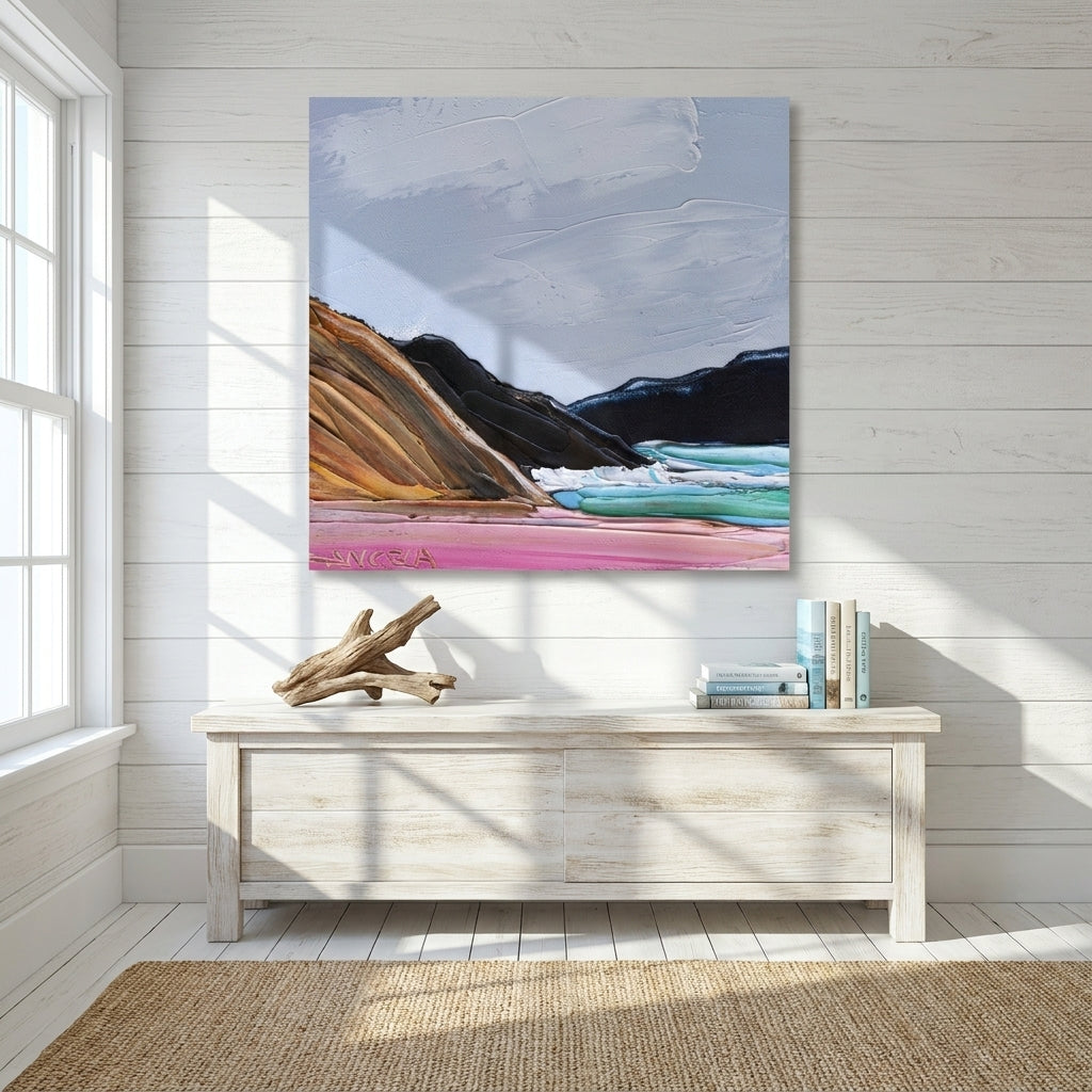 Stretched canvas wall art styled on the wall in a coastal living room