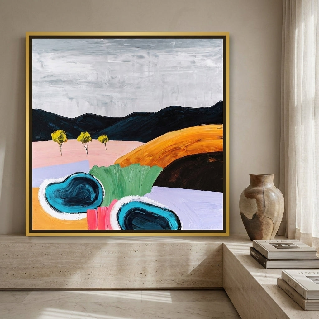 Canvas wall art with a gold leaf surround standing on a console in a luxe bedroom