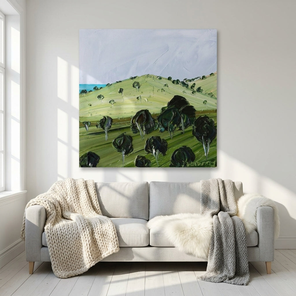 Stretched canvas wall art styled on the wall in a bright Scandinavian living room
