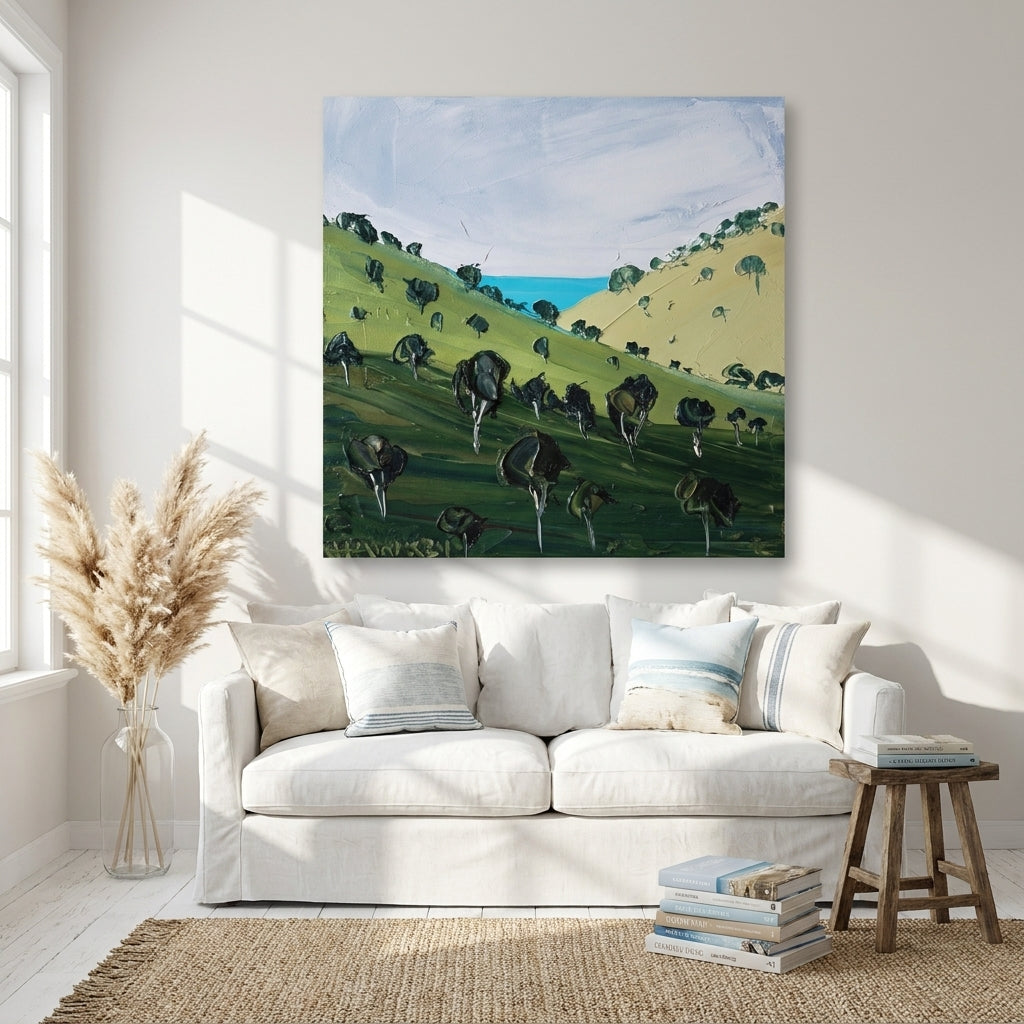Stretched canvas wall art styled on the wall in a coastal living room