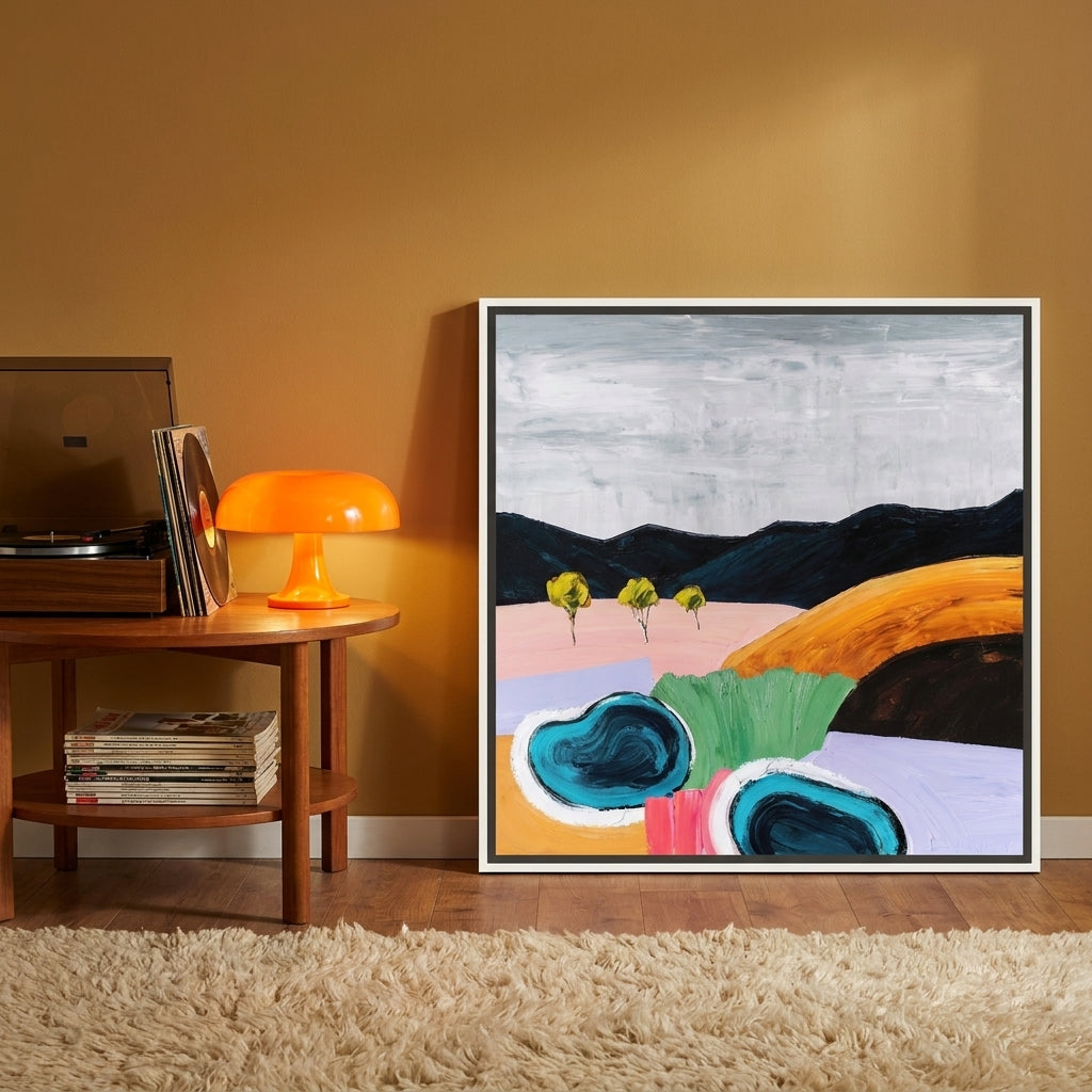 Canvas wall art with a white surround leaning against the wall in a retro 70s dining room