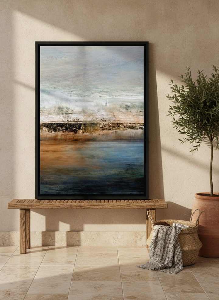 Canvas wall art with a black surround standing on a bench in a Mediterranean living room
