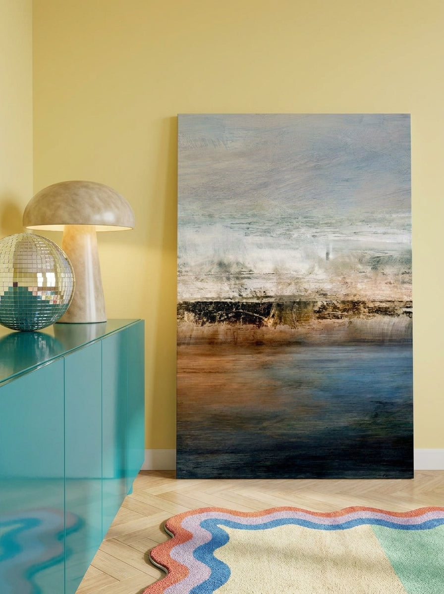Stretched canvas wall art standing on a sideboard in a colourful eclectic home office