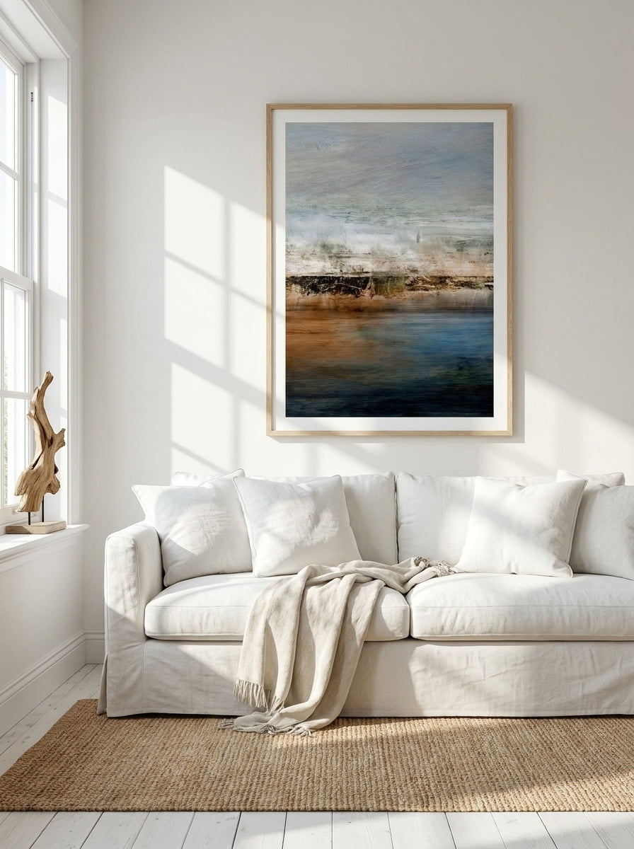 Modern wall art print styled on the wall in a coastal living room