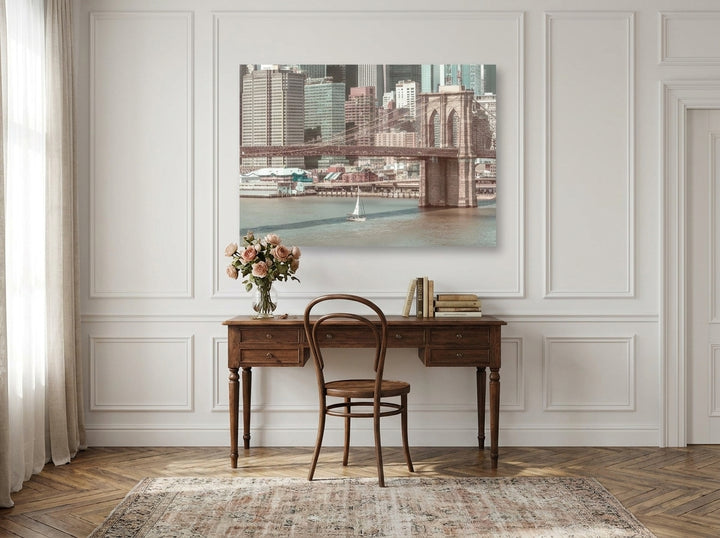 Stretched canvas wall art styled on the wall in a Parisian home office