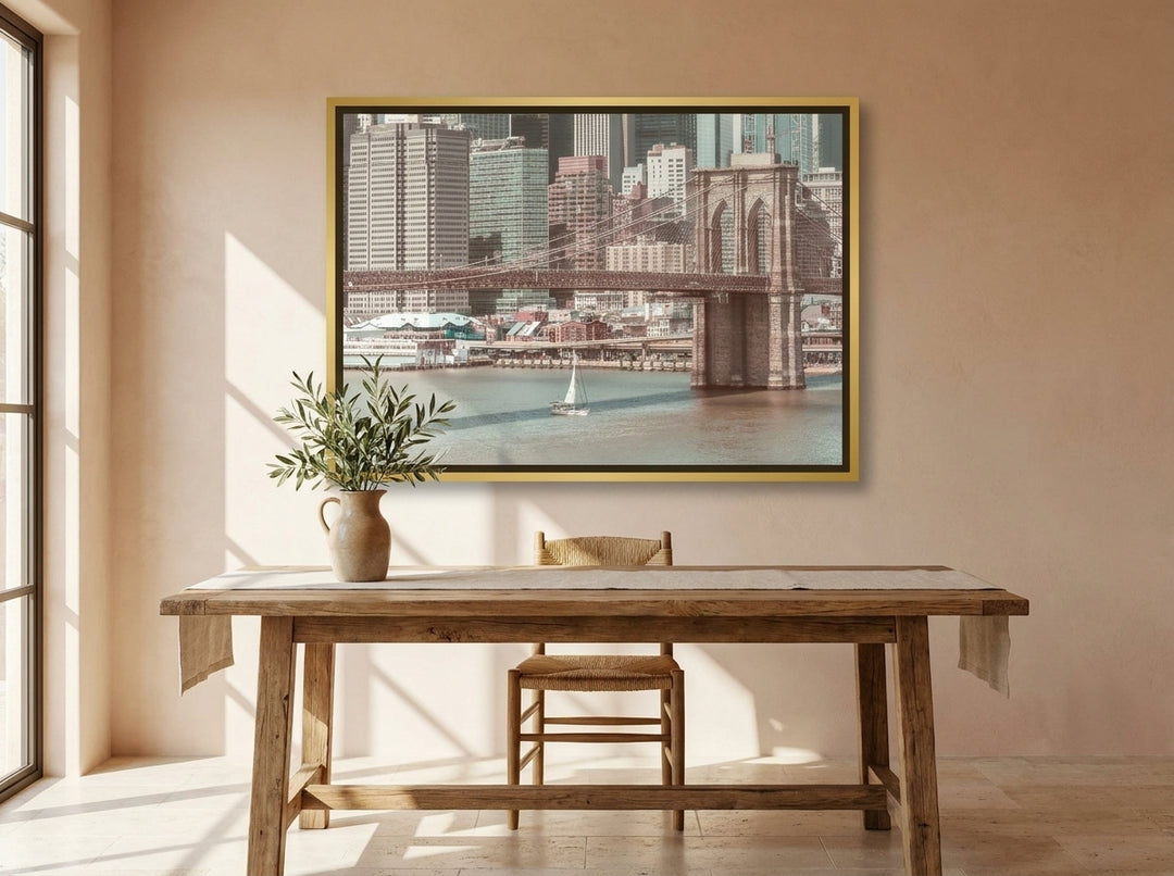 Canvas wall art with a gold leaf surround styled on the wall in a Mediterranean home office