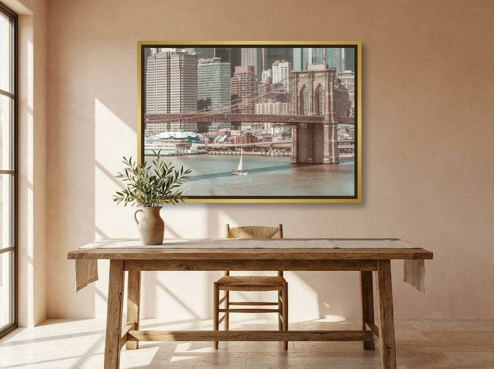 Canvas wall art with a gold leaf surround styled on the wall in a Mediterranean home office