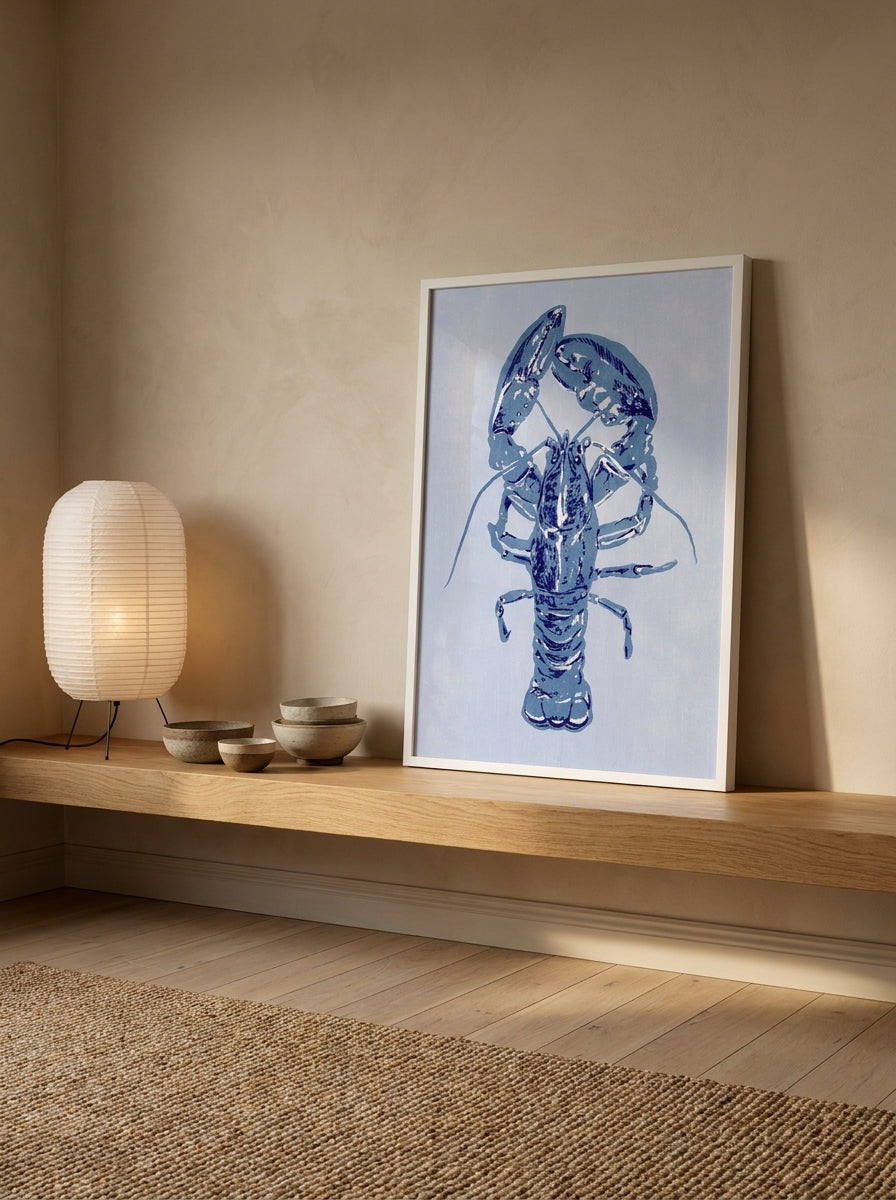 Modern wall art print standing on a shelf in a warm Japandi bathroom