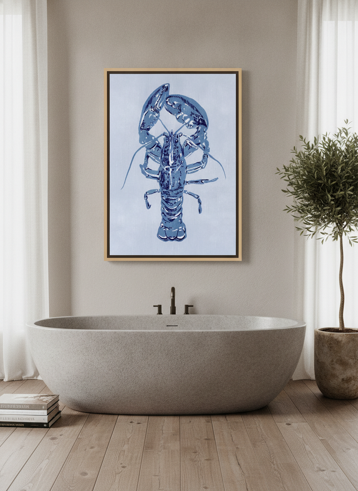 Canvas wall art with a natural timber surround styled on the wall in a luxe bathroom