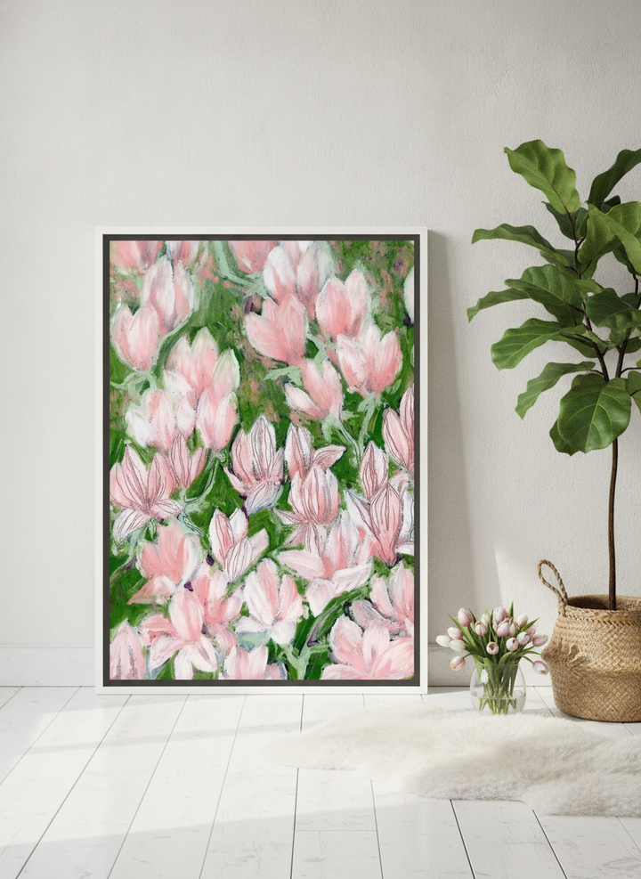Canvas wall art with a white surround leaning against the wall in a bright Scandinavian bathroom