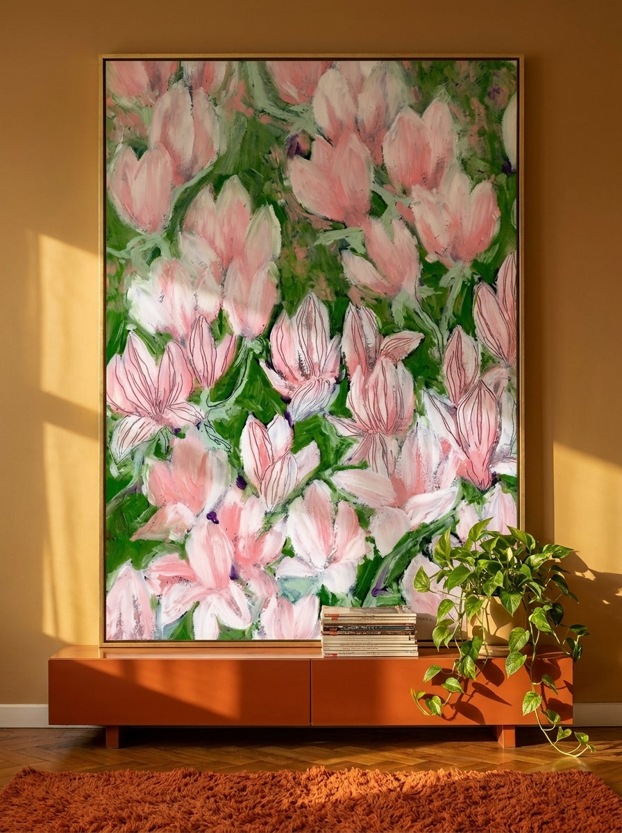 Oversized statement canvas wall art with a gold leaf surround styled on the wall in a retro 70s living room