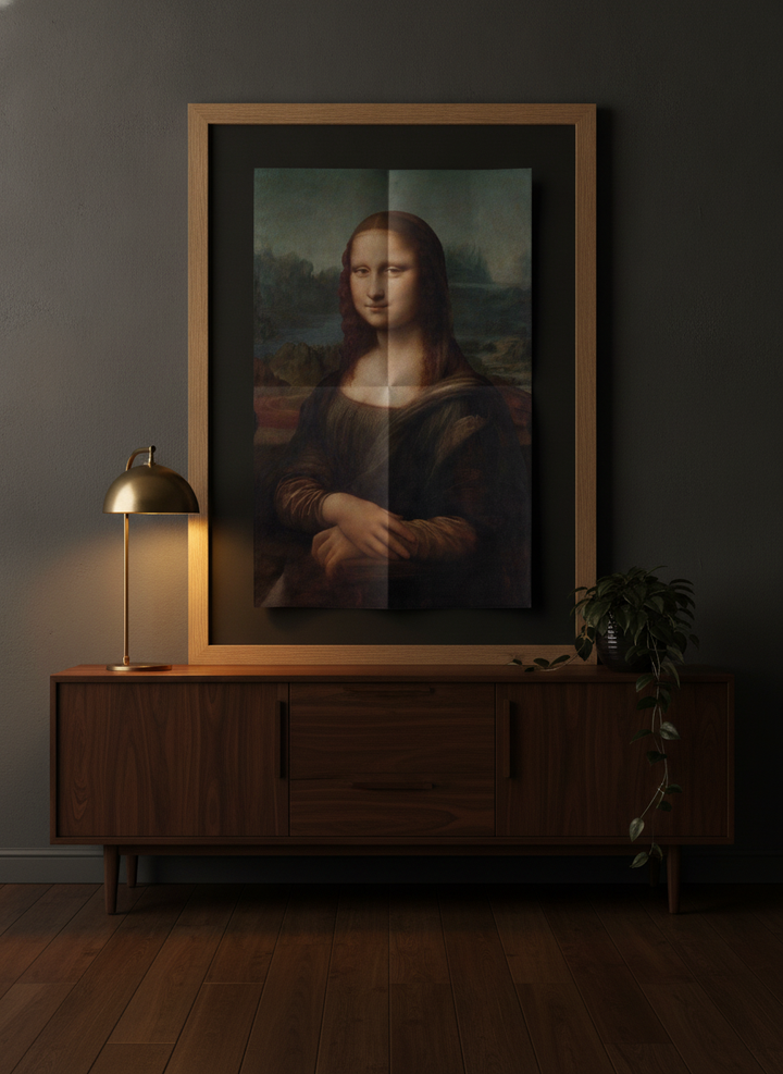 Modern wall art print standing on a sideboard in a moody living room