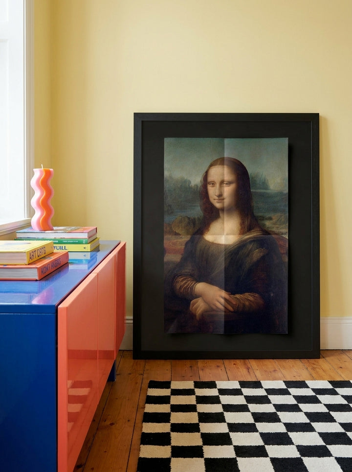 Modern wall art print standing on a sideboard in a colourful eclectic home office