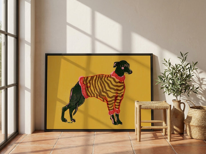 Canvas wall art with a black surround leaning against the wall in a Mediterranean home office