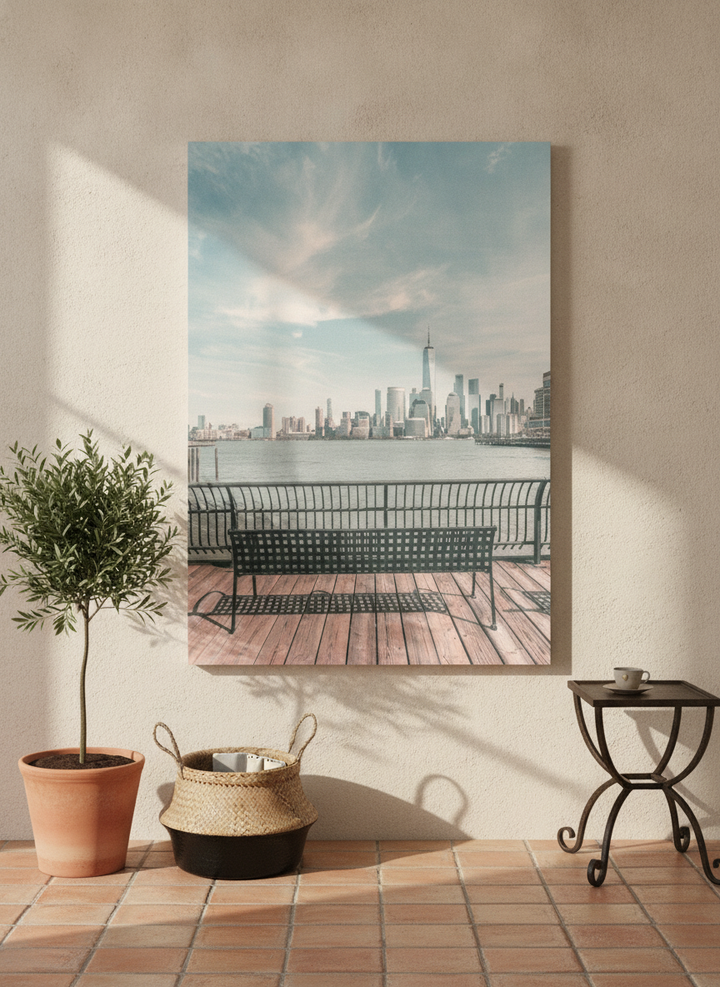 Stretched canvas wall art leaning against the wall in a Mediterranean bedroom