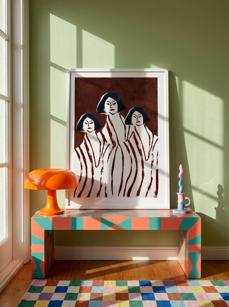 Modern wall art print standing on a side table in a colourful eclectic living room