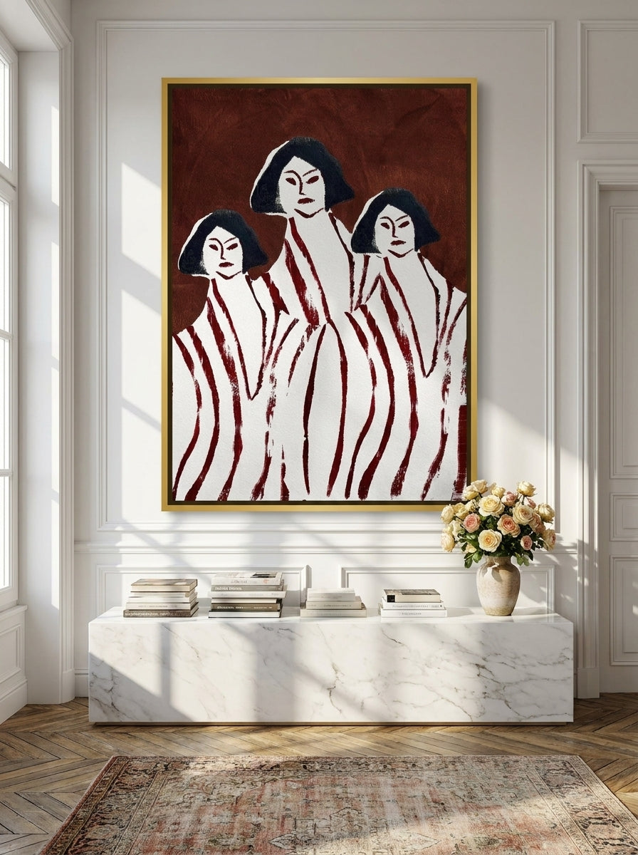 Oversized statement canvas wall art with a gold leaf surround styled on the wall in a Parisian living room