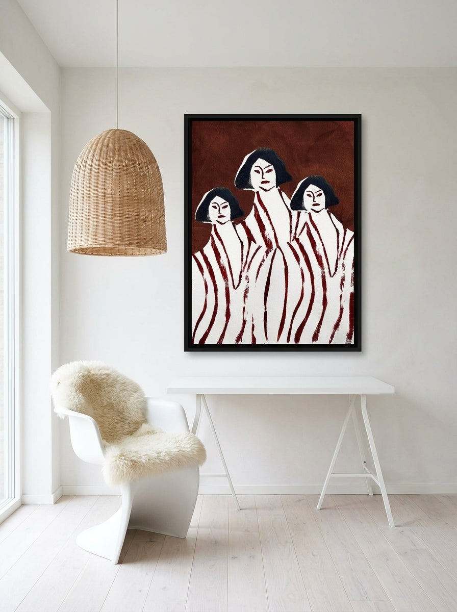 Canvas wall art with a black surround styled on the wall in a bright Scandinavian home office
